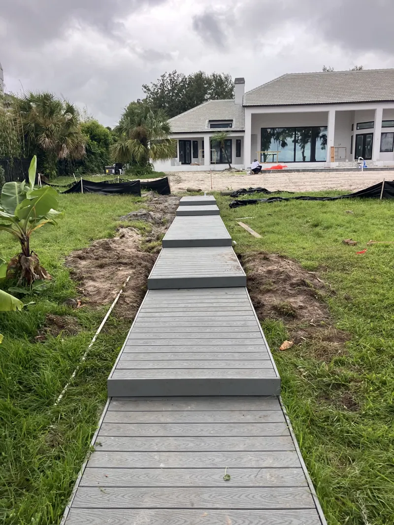 Stepped composite walkway down to the water