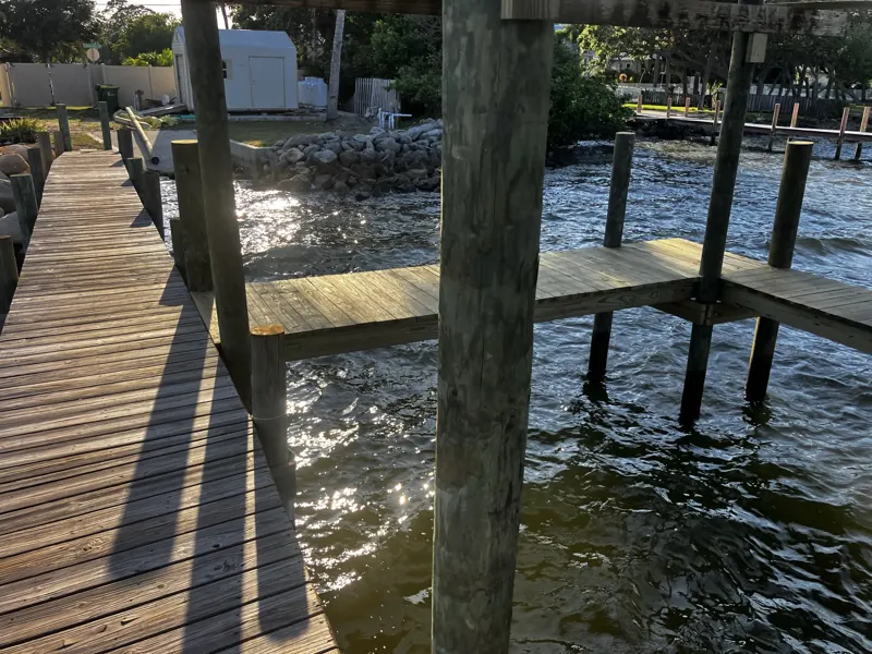 Fixed dock walkway on timber pilings