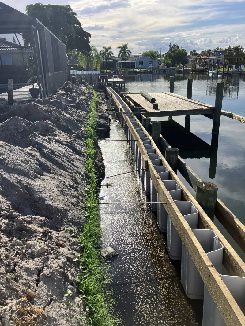 Vinyl sheet-pile seawall going in